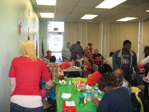 Everyone is enjoying the lunch at the Christmas party